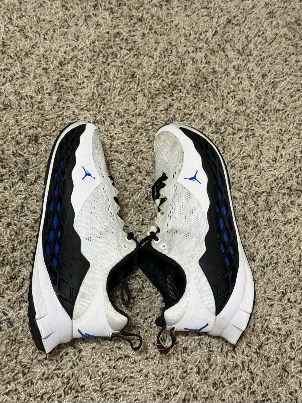 Jordan Men's White Athletic Shoes with Black and Blue Accents